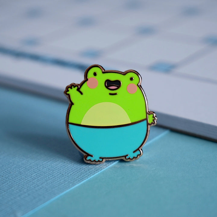 frog pin with notebook