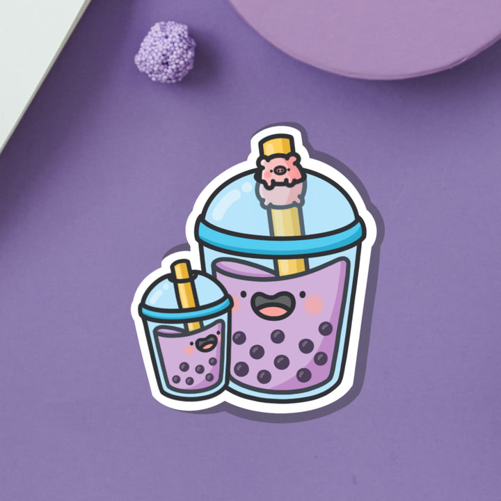 Two bubble teas vinyl sticker on purple background