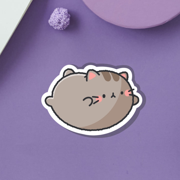 Flying cat vinyl sticker on purple background