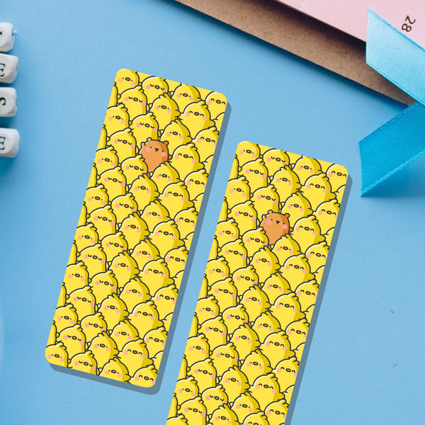 Cute chick bookmark on blue table