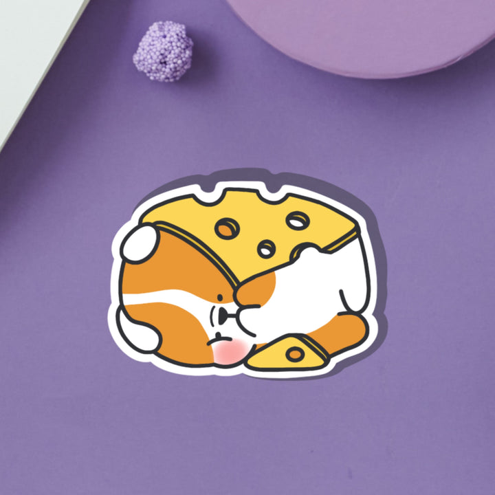Dog wrapped in cheese vinyl sticker on purple table