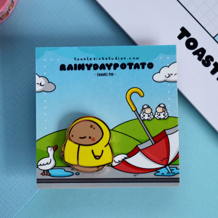 Potato pin on rainy day backing card