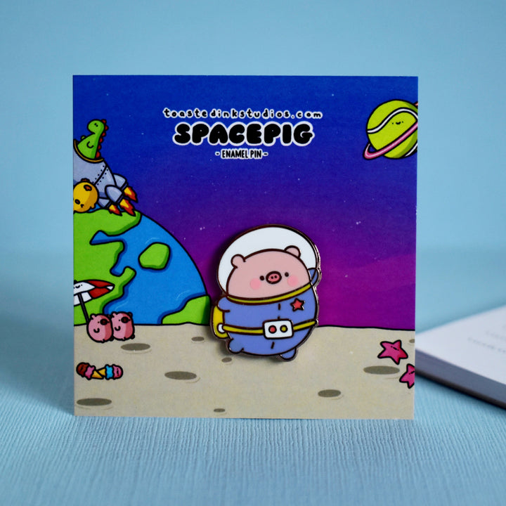 space backing card with pig enamel pin