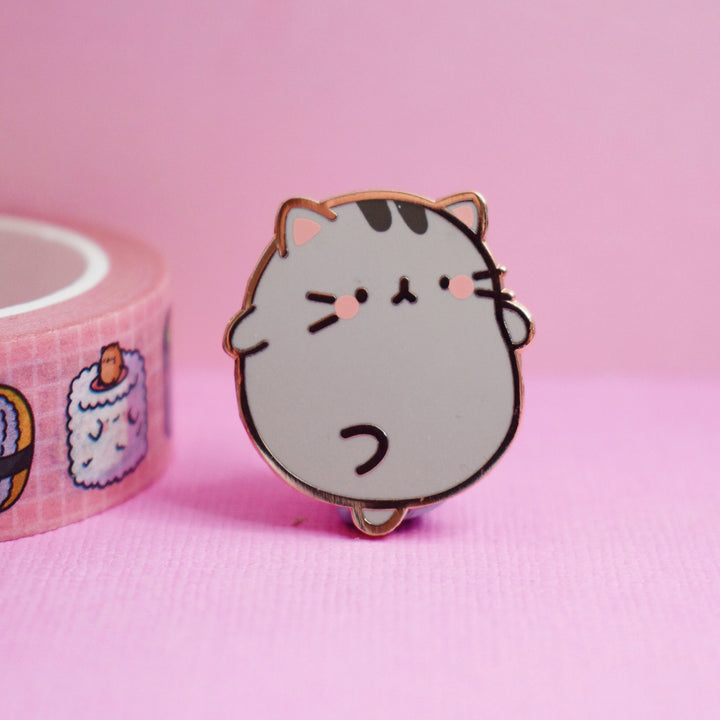 Cute Kitty Cat Enamel Pin on pink table