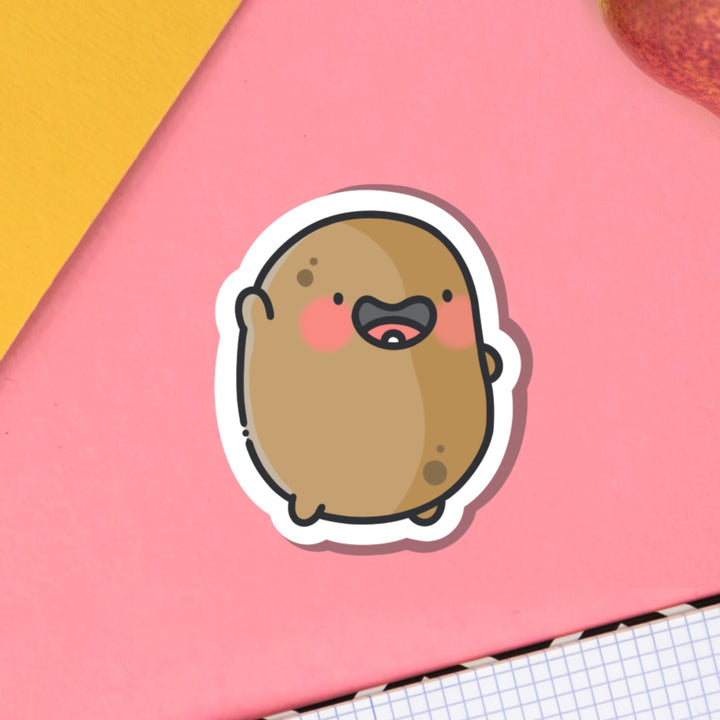 Potato waving vinyl sticker on pink table
