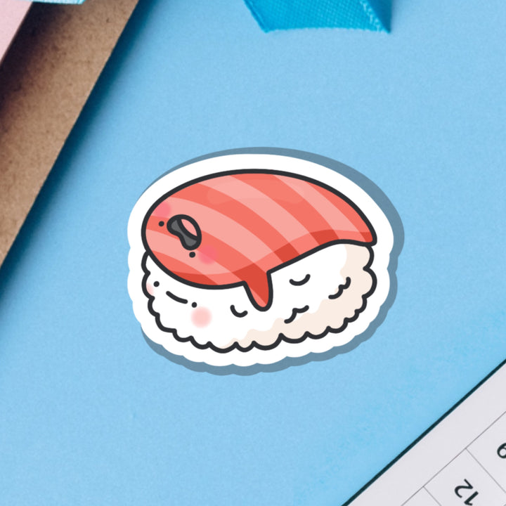 Salmon sushi vinyl sticker on blue background