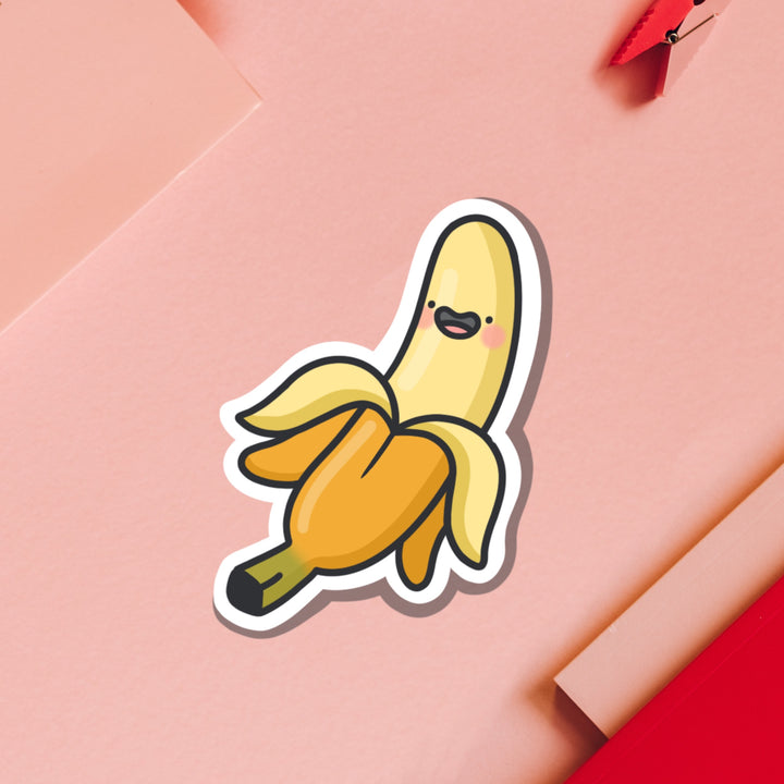 Happy banana vinyl sticker on pink table