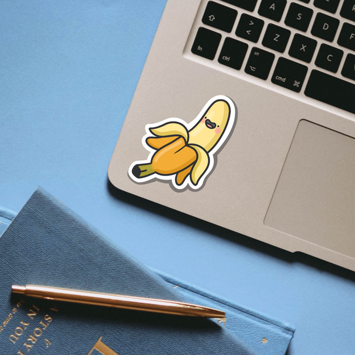 Happy banana vinyl sticker on laptop