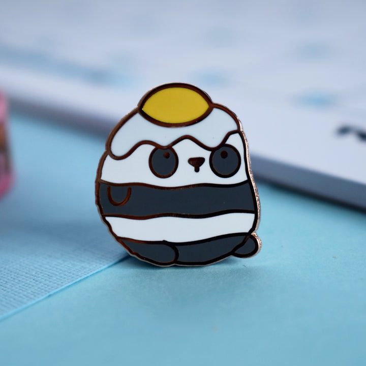 Panda with egg on his head enamel pin