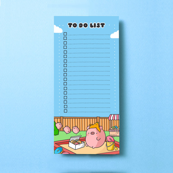 Pig To do list pad on blue background