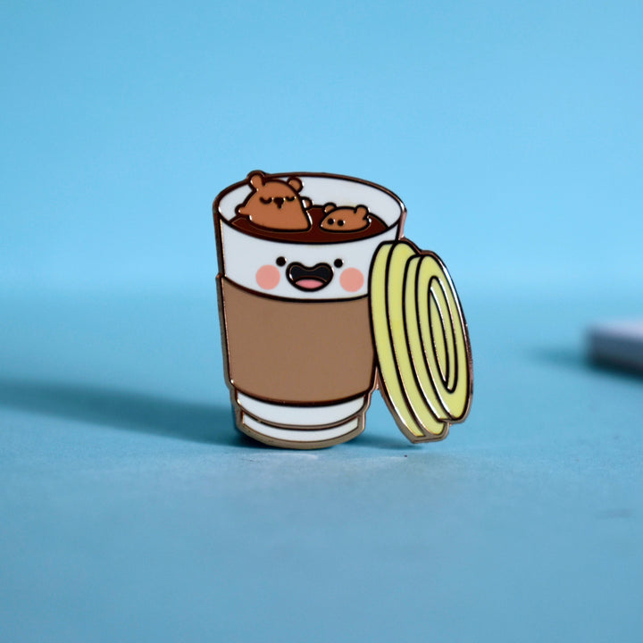 Coffee Cup Enamel pin on blue background