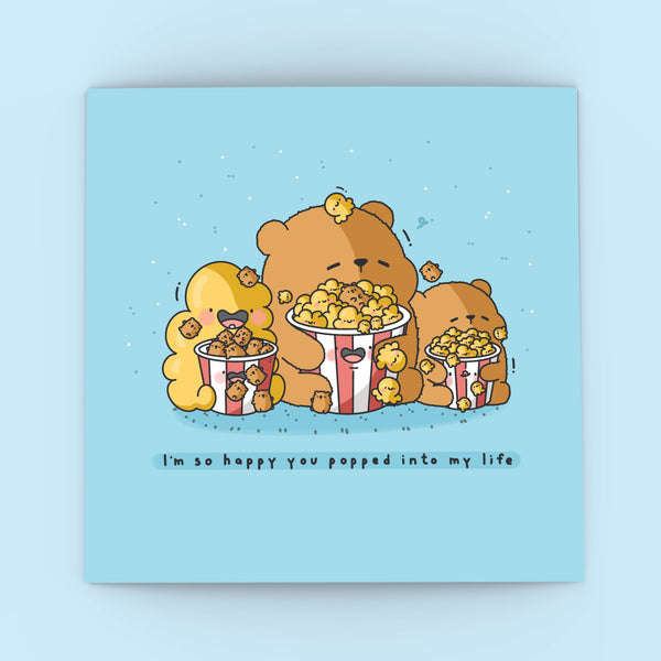 Popcorn bear card on blue background