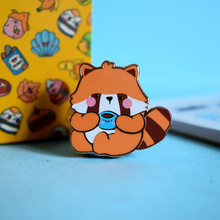 Red Panda enamel pin with notebook