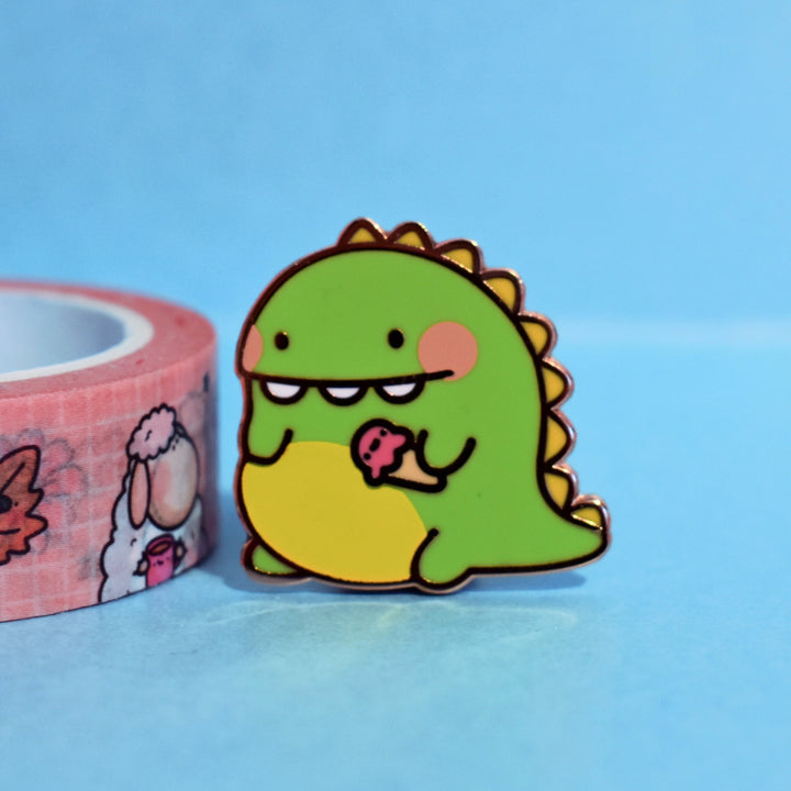 Dinosaur Pin with washi tape on blue background
