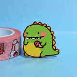 Dinosaur Pin with washi tape on blue background