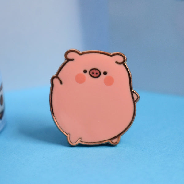 Pig enamel pin blue background