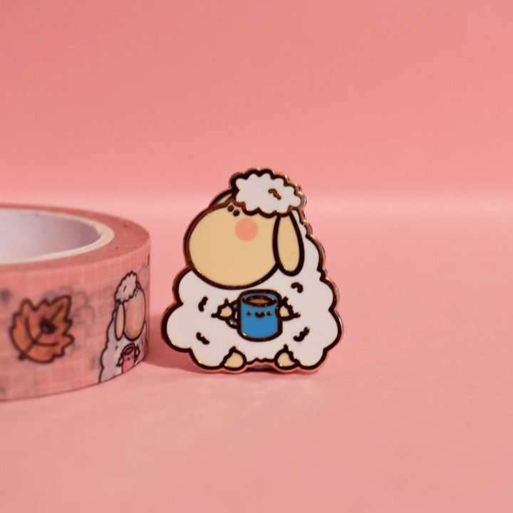 Cute Sheep Lapel Pin on pink table