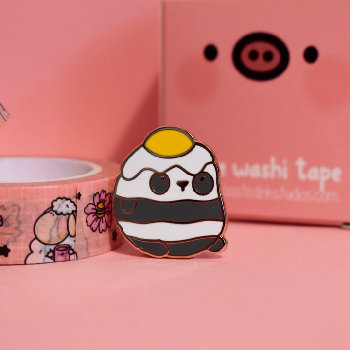 Cute Panda pin on pink table with washi tape